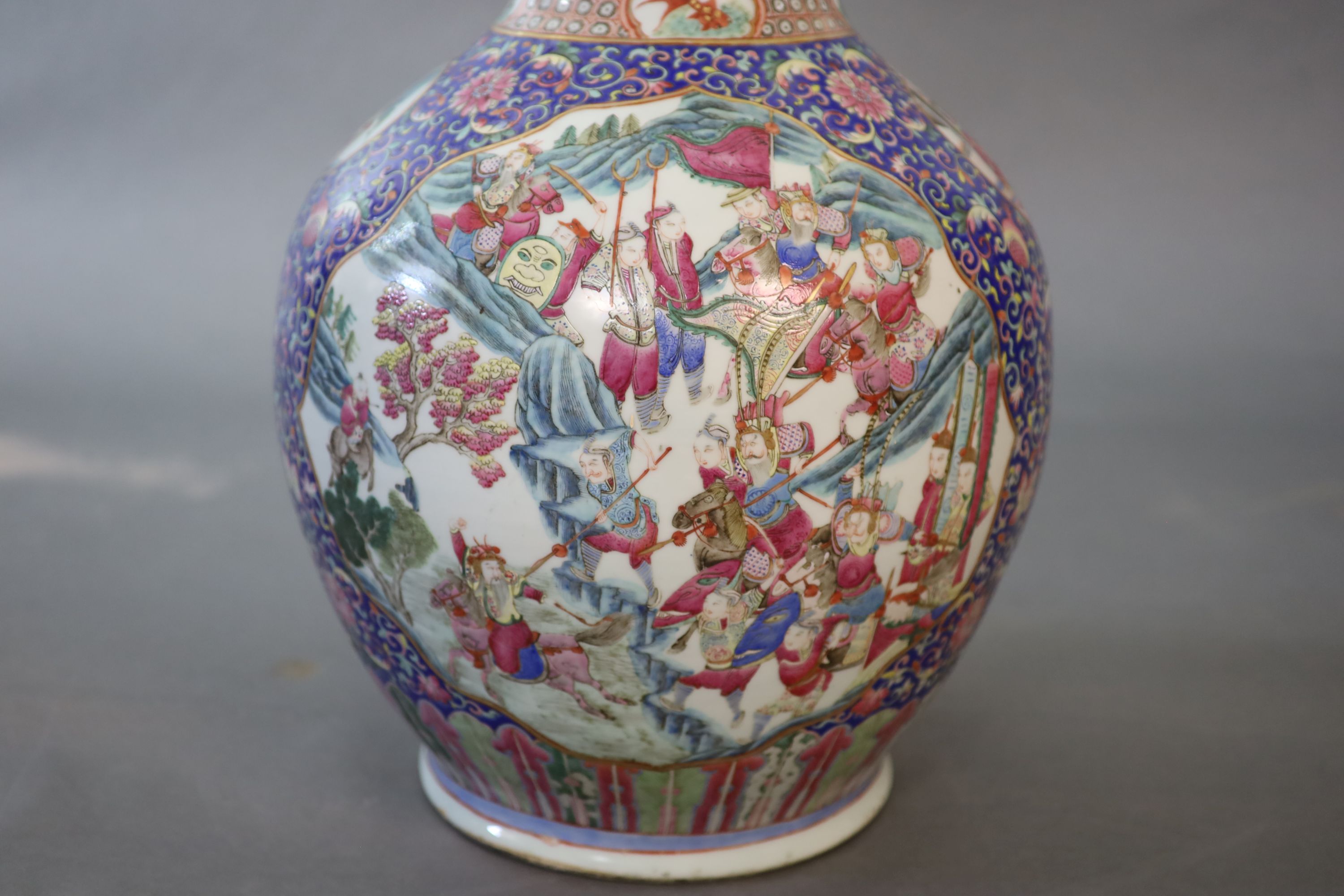 A massive Chinese blue ground bottle vase, Daoguang period (1821-50), 88cm high, neck broken and re-glued